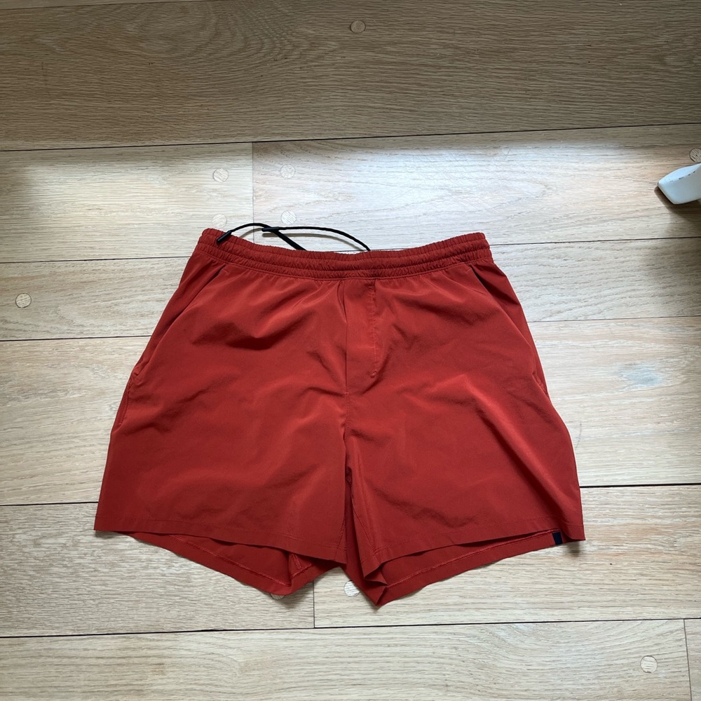 Men's orange 7” Athletic Shorts no liner